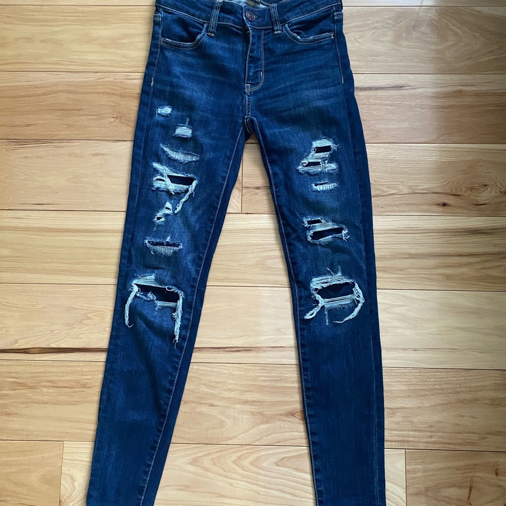 AEO distressed denim jeans with patched holes. Size women’s 00 short.